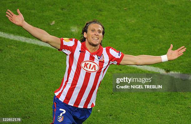 This file picture dated May 12, 2010 shows Atletico Madrid's Uruguayan forward Diego Forlan celebrating after scoring during the final football match...