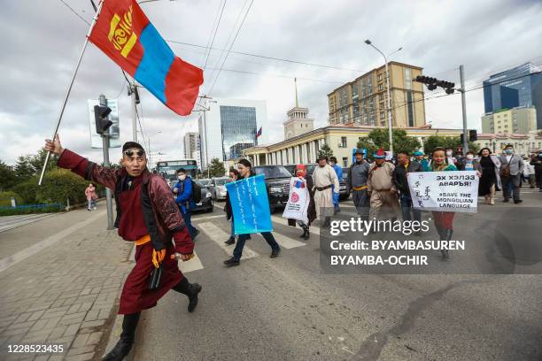 Mongolians protest against China's plan to introduce Mandarin-only classes at schools in the Chinese province of Inner Mongolia, at Sukhbaatar Square...