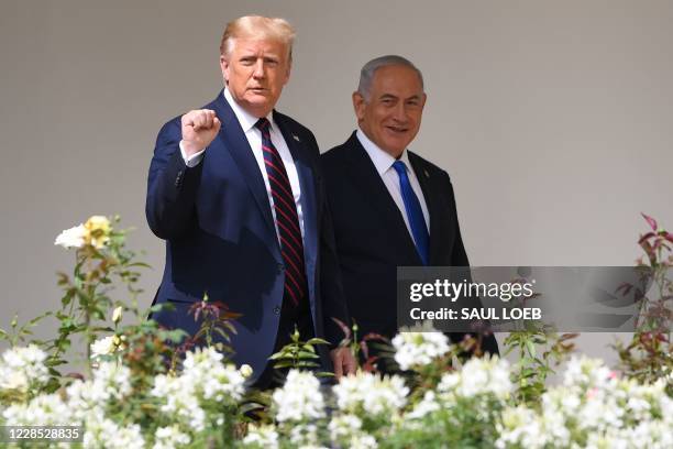 President Donald Trump arrives with Israeli Prime Minister Benjamin Netanyahu, before Bahrain Foreign Minister Abdullatif al-Zayani and Foreign...