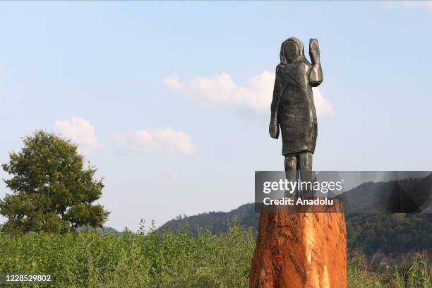 Bronze replica depicting US First Lady Melania Trump, made by US artist Brad Downey, is seen after its unveiling in a field near US First Lady's...