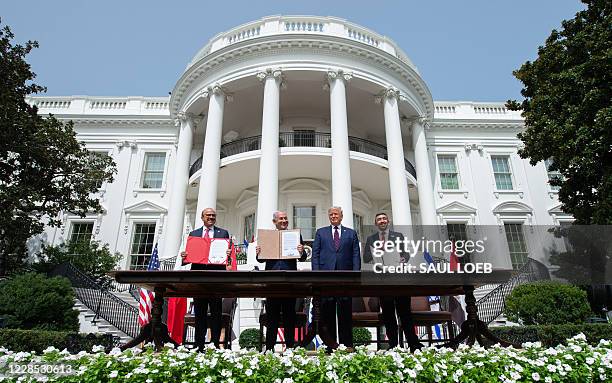 Bahrain Foreign Minister Abdullatif al-Zayani, Israeli Prime Minister Benjamin Netanyahu, US President Donald Trump, and UAE Foreign Minister...