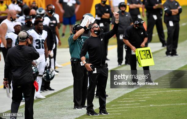 Eagles offensive coordinator Mike Groh coaches from the sideline during the Philadelphia Eagles vs. Washington Football Team NFL game at FedEx Field...