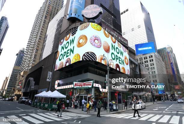 Outside view of the new Krispy Kreme flagship store amid the coronavirus pandemic in Times Square, New York, September 15, 2020. - The 4,500...