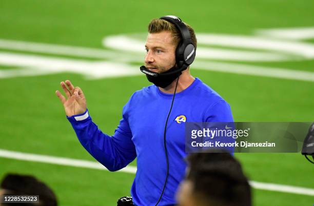Head coach Sean McVay of the Los Angeles Rams on the sideline with his face mask down to his chin during the game against the Dallas Cowboys at SoFi...