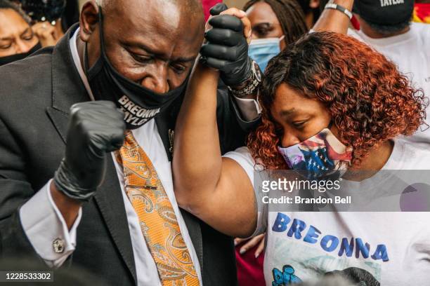 Attorney Ben Crump and Tamika Palmer, mother of Breonna Taylor, celebrate after a news conference on September 15, 2020 in Louisville, Kentucky. It...