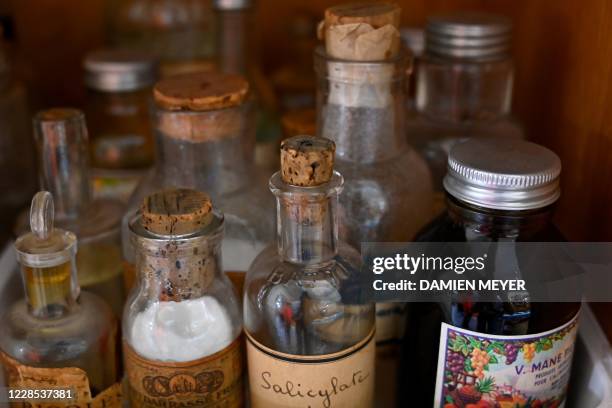 This photograph taken on September 15 shows medicine bottles on display at The Hospital Heritage Conservatory in Rennes, western France. - Pedal...