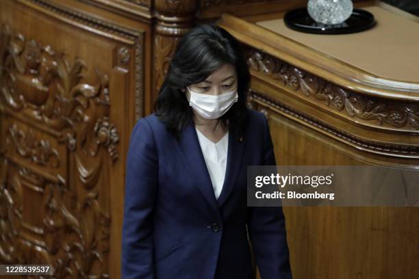 Seiko Noda, Japan's former internal affairs minister, walks back to her seat after casting her ballot for the nomination of Japan's prime minister...