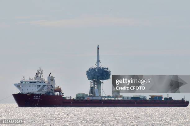 Long March 11 carrier rocket stands on board the launch vessel, the DE Bo 3, in the Yellow Sea. Yantai city, Shandong Province, China, 15 September...