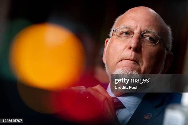 Centers for Disease Control and Prevention Director Dr. Robert Redfield attends a hearing of the Senate Appropriations subcommittee reviewing...