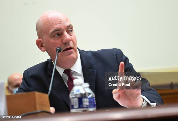 Clarke Cooper, Assistant Secretary of State for Political-Military Affairs, testifies before a House Committee on Foreign Affairs hearing looking...