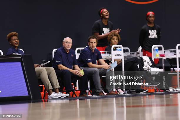 Head Coach Mike Thibault and Assistant Coach Eric Thibault of the Washington Mystics look on during the game against the Chicago Sky on August 1,...