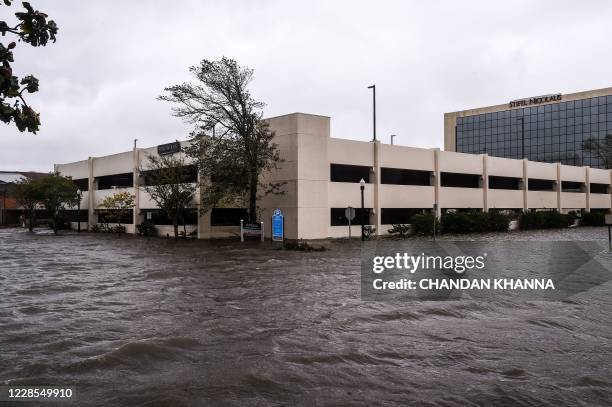 Flooded parking lot is seen during Hurricane Sally in downtown Pensacola, Florida on September 16, 2020. - Hurricane Sally barrelled into the US Gulf...