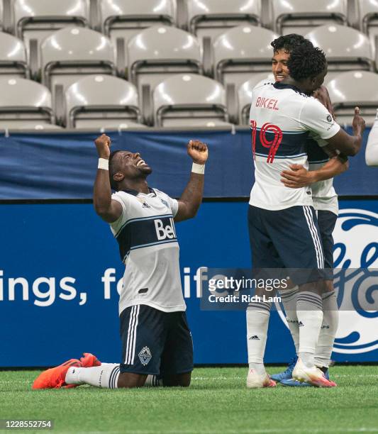 Cristian Dajome of the Vancouver Whitecaps celebrates after scoring a goal against the Montreal Impact during MLS soccer action at BC Place on...