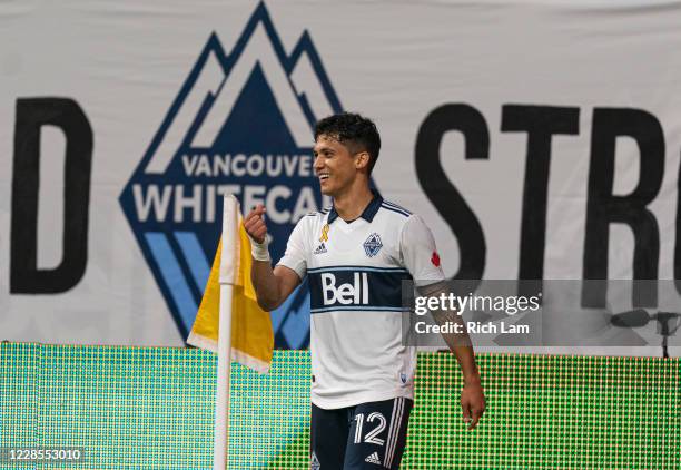 Fredy Montero of the Vancouver Whitecaps celebrates after scoring a goal against the Montreal Impact during MLS soccer action at BC Place on...