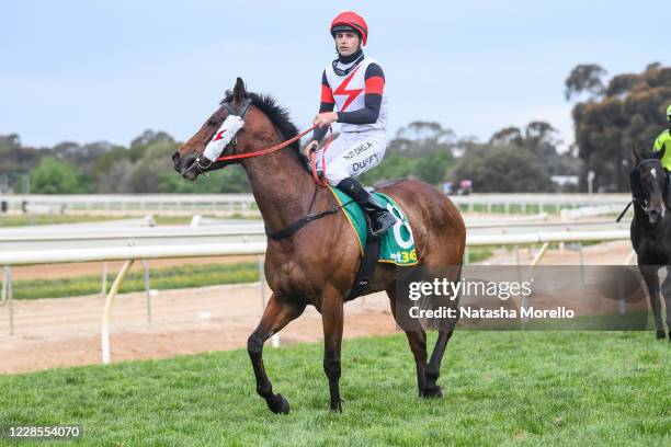 Jake Duffy returns to the mounting yard aboard Encircle after winning the bet365 Odds Drift Protector BM64 Handicap at Echuca Racecourse on September...