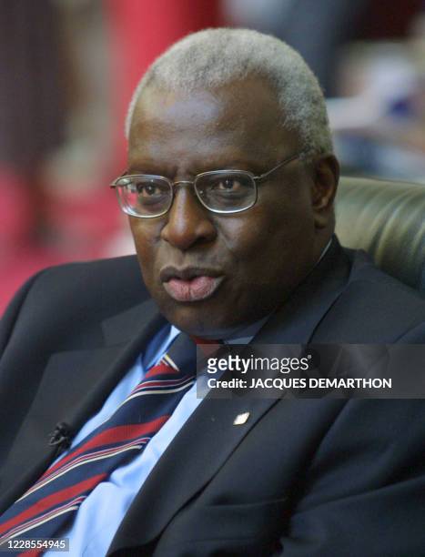 Portrait of Senegalese IOC member Lamine Diack taken 15 July 2001 during the 112th session of the International Olympic Committee in Moscow. The...