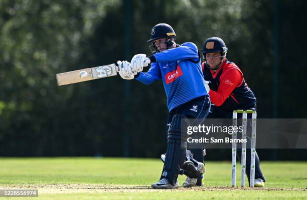 Down , United Kingdom - 17 September 2020; Lorcan Tucker of Leinster Lightning hits a four watched by Gary Wilson of Northern Knights during the Test...