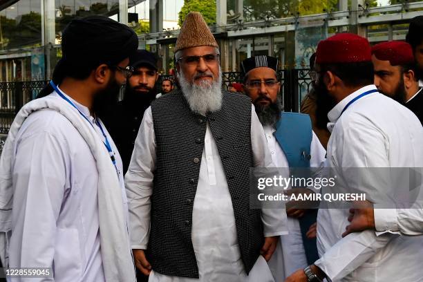 Maulana Ahmad Ludhianvi , the head of hard line Pakistani Sunni Muslim party Ahle Sunnat Wal Jamaat , arrives to attend an anti-Shiite protest rally...