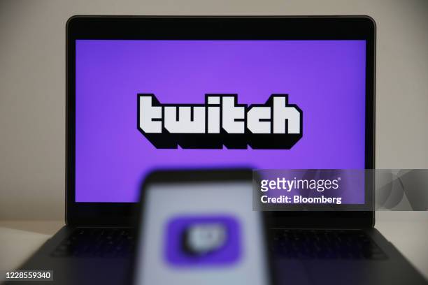 Laptop computer displays a logo for the Twitch streaming app, operated by Amazon.com Inc., in this arranged photograph in London, U.K., on Thursday,...