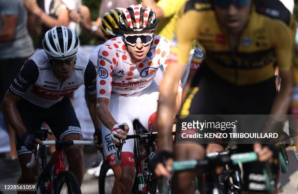 Team UAE Emirates rider Slovenia's Tadej Pogacar wearing the best climber's polka dot jersey rides during the 18th stage of the 107th edition of the...