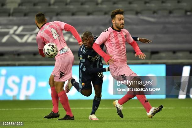 Djurgarden's Edward Chilufya vies for the ball with Europa FC's Olmo Gonzalez Casado and Ethan Jolley during the UEFA Europe League second qualifying...