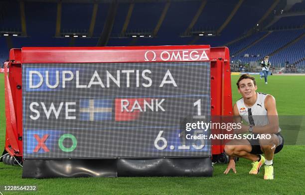 Sweden Armand Duplantis poses after clearing 6.15m to set a new Men's pole vault world record during the IAAF Diamond League competition on September...