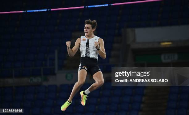 Sweden Armand Duplantis celebrates after clearing 6.15m to set a new outdoor Men's pole vault world record during the IAAF Diamond League competition...