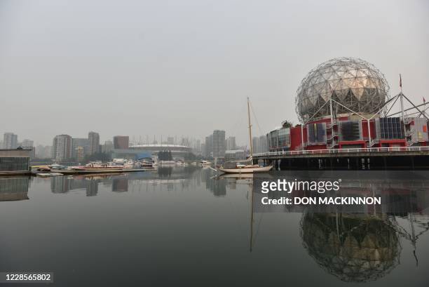 Science World , British Columbia Place Stadium and the Vancouver skyline are seen from False Creek, in Vancouver, Canada, September 17, 2020. - South...