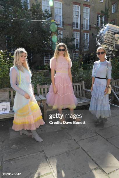 Alison Sudol, Veronika Heilbrunner and Laura Bailey attend the Bora Aksu catwalk show during London Fashion Week September 2020 at St Paul's Church...