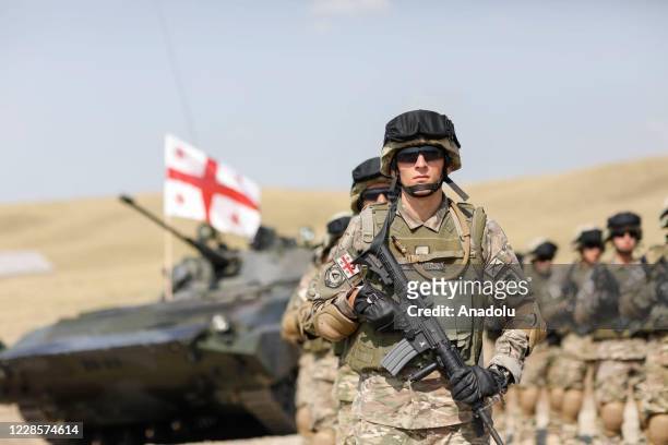 Soldiers are seen during the closing ceremony of Multinational Exercise Noble Partner 2020 at the Vaziani Military Base in Tbilisi, Georgia on...