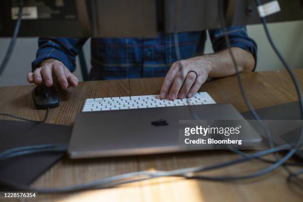 Person works from home in a cabin in Truckee, California, U.S., on Monday, Sept. 7, 2020. With many companies from the tech-heavy Bay Area embracing...