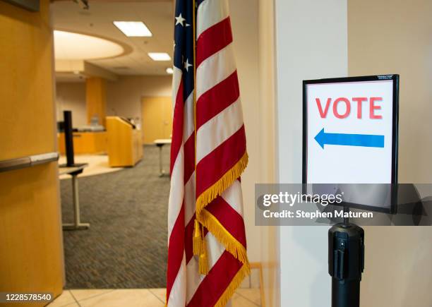 Signage directs voters at the Beltrami County Administration building on September 18, 2020 in Bemidji, Minnesota. Early voting starts today in...