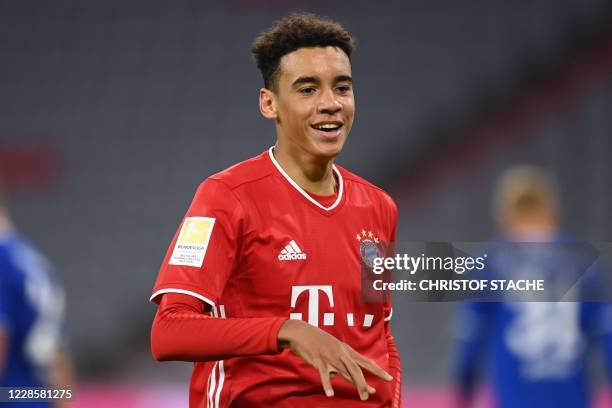 Bayern Munich's German midfielder Jamal Musiala celebrates scoring the 8-0 goal during the German first division Bundesliga football match FC Bayern...