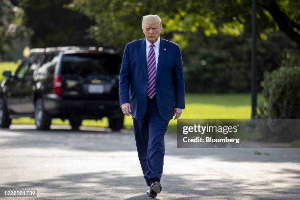 President Donald Trump walks towards Marine One on the South Lawn of the White House in Washington, D.C., U.S., on Friday, Sept. 18, 2020....