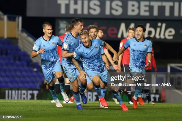 Kyle McFadzean of Coventry City celebrates after scoring a goal to make it 3-2 during the Sky Bet Championship match between Coventry City and Queens...