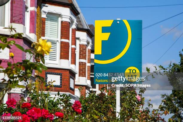 Foxtons estate agent's 'To Let' sign seen outside a residential property in London.