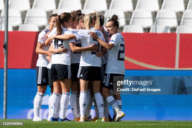 Marina Hegering of Germany celebrates after scoring his team's first goal during the UEFA Women's EURO 2022 Qualifier between Germany Women's and...