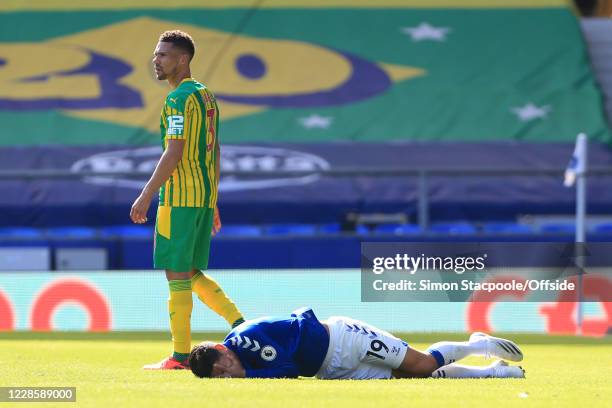 Kieran Gibbs of West Brom walks away after fouling James Rodriguez of Everton ; Gibbs is later shown a red card during the Premier League match...