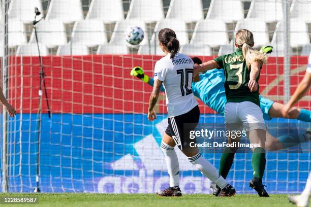 Dzsenifer Marozsan of Germany scores his team's second goal during the UEFA Women's EURO 2022 Qualifier between Germany Women's and Ireland Women's...