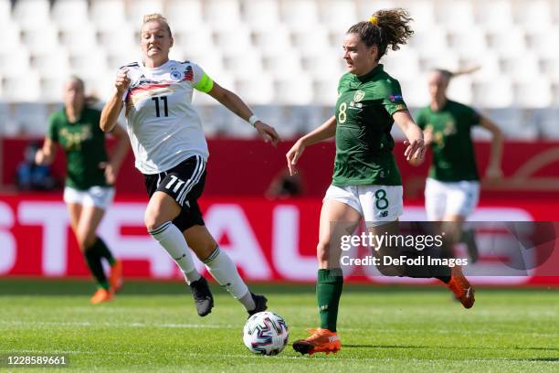 Alexandra Popp of Germany and Leanne Kiernan of Republik Irland battle for the ball during the UEFA Women's EURO 2022 Qualifier between Germany...