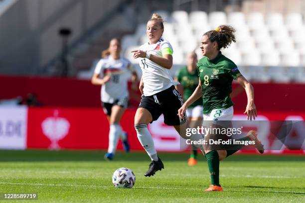 Alexandra Popp of Germany and Leanne Kiernan of Republik Irland battle for the ball during the UEFA Women's EURO 2022 Qualifier between Germany...