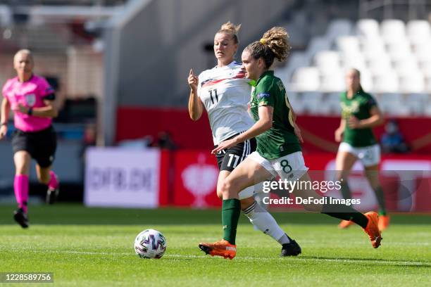 Alexandra Popp of Germany and Leanne Kiernan of Republik Irland battle for the ball during the UEFA Women's EURO 2022 Qualifier between Germany...