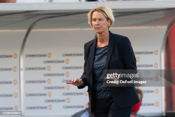 Head coach Martina Voss-Tecklenburg of Germany gestures during the UEFA Women's EURO 2022 Qualifier between Germany Women's and Ireland Women's at...