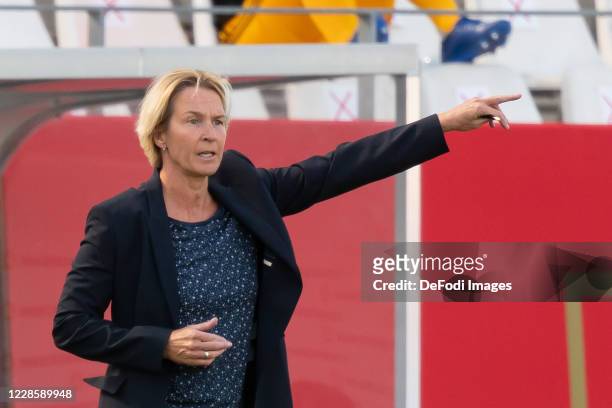 Head coach Martina Voss-Tecklenburg of Germany gestures during the UEFA Women's EURO 2022 Qualifier between Germany Women's and Ireland Women's at...