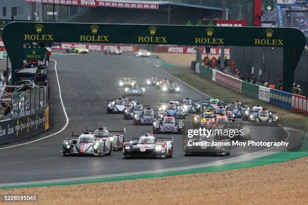 The Toyota Gazoo Racing TS050 Hybrid of Mike Conway, Kamui Kobayashi, and Jose Maria Lopez leads at the start of the race of the 24 Hours of Le Mans...