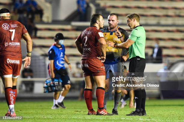 Anthony Etrillard of Toulon, Ken Owens of Scarlets and Andrew BRACE, referee during the Quarter-Final Challenge Cup match between Toulon and Scarlets...