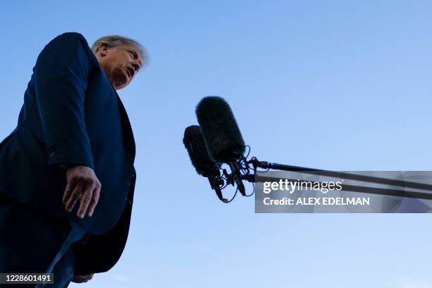 President Donald Trump speaks with reporters on the South Lawn prior to departing the White House abroad Marine One on September 19, 2020 in...