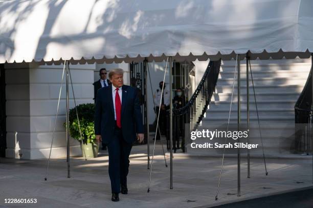 President Donald Trump walks to speak to members of the press prior to his departure from the White House on September 19, 2020 in Washington, DC....