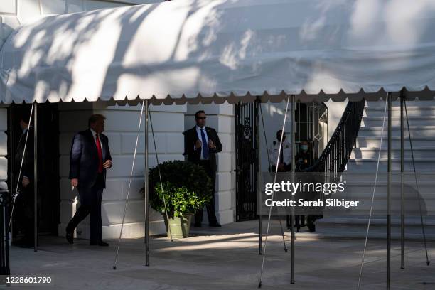 President Donald Trump walks to speak to members of the press prior to his departure from the White House on September 19, 2020 in Washington, DC....