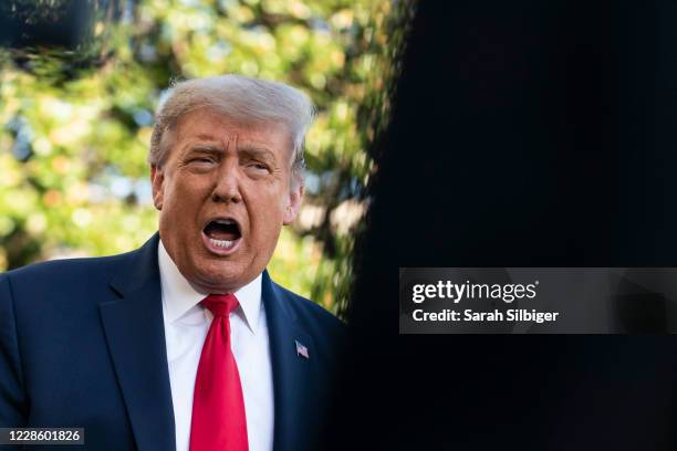 President Donald Trump speaks to members of the press prior to his departure from the White House on September 19, 2020 in Washington, DC. President...